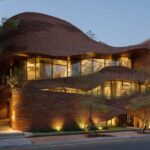 Undulating Brick Facade That Balances Light and Privacy (Complete Guide)